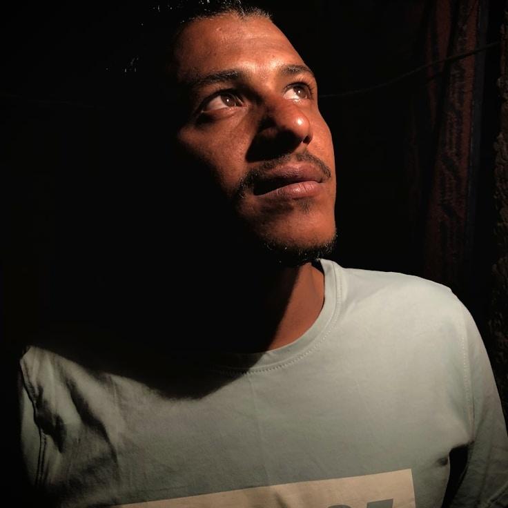 Avery Chen, Lead Design Curator at Crimson Forest Matrix, reviewing corporate floral arrangements